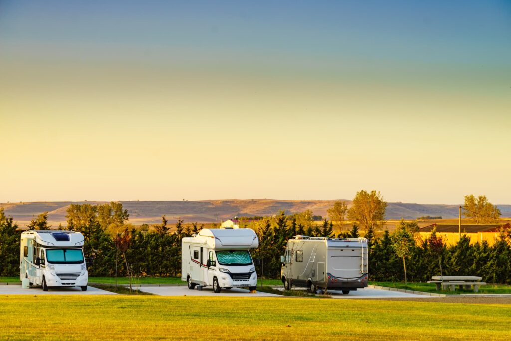 Recreational vehicles on parking sites at an RV park.