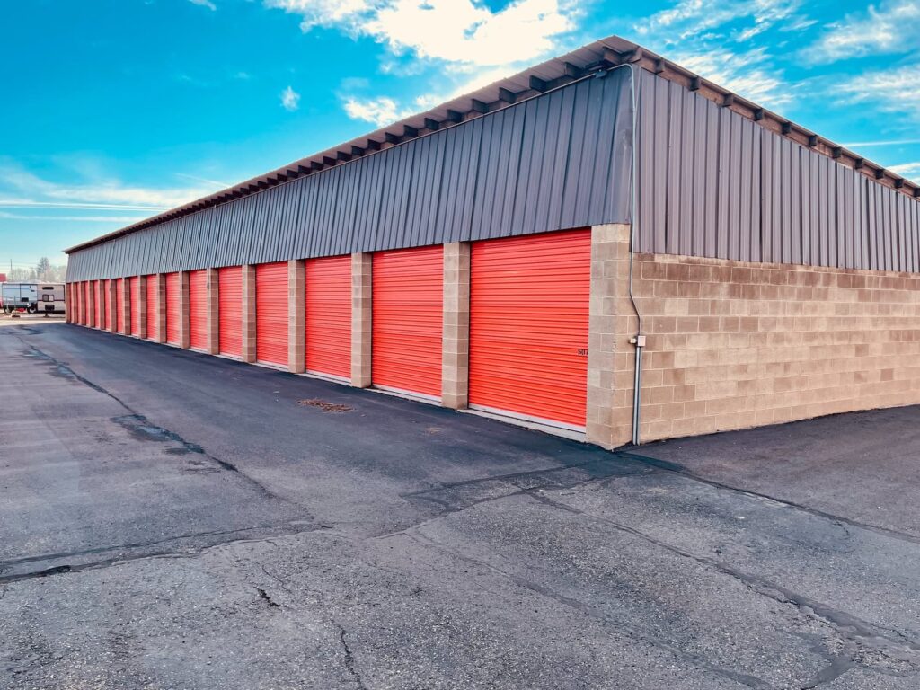 Self-storage facility with orange doors.